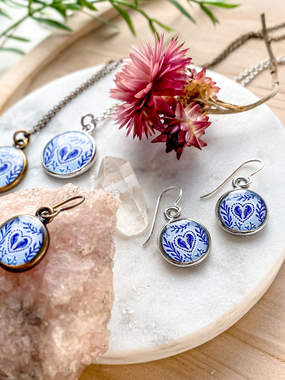 a set of blue and white porcelain jewelry