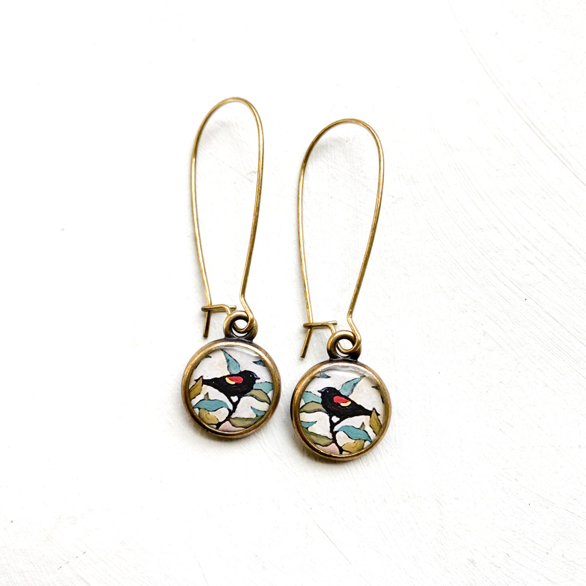 Red Wing Blackbird Bronze Earrings, artwork by guest artist Hannah Seng