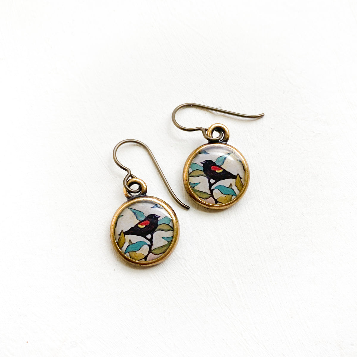 Red Wing Blackbird Bronze Earrings, artwork by guest artist Hannah Seng