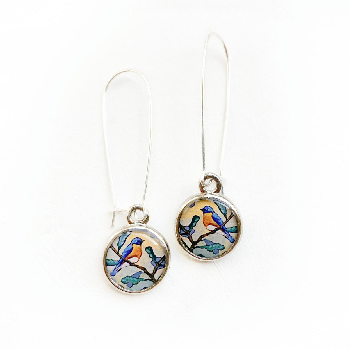 Bluebird Silver Earrings, artwork by guest artist Hannah Seng