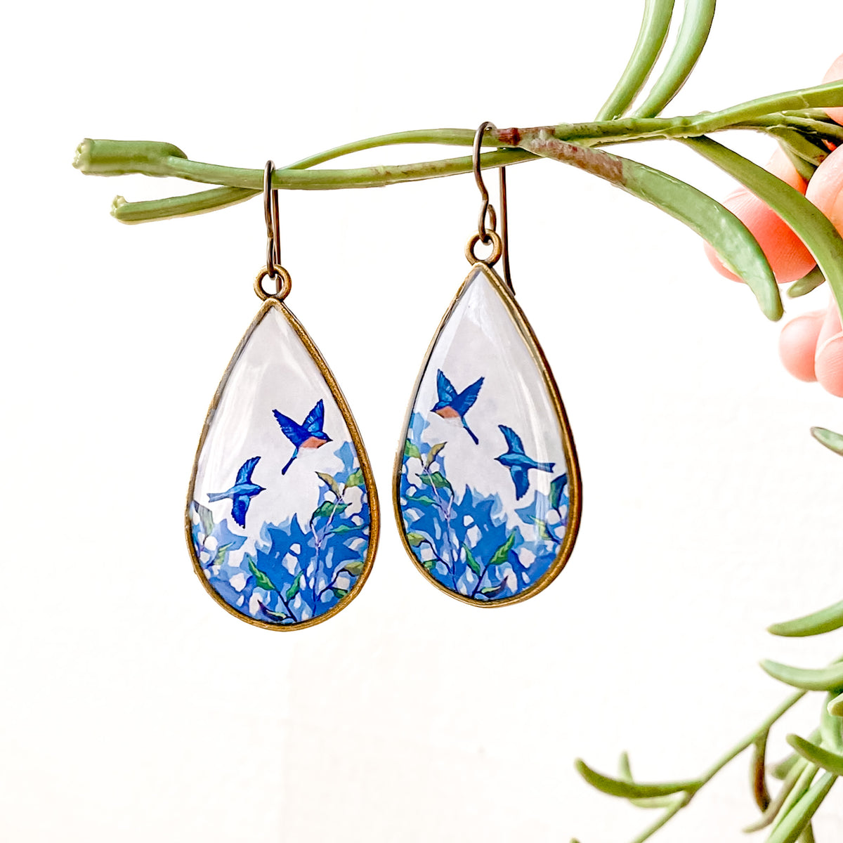 Bluebirds in Flight Teardrop Earrings, Artwork by guest artist Hannah Seng