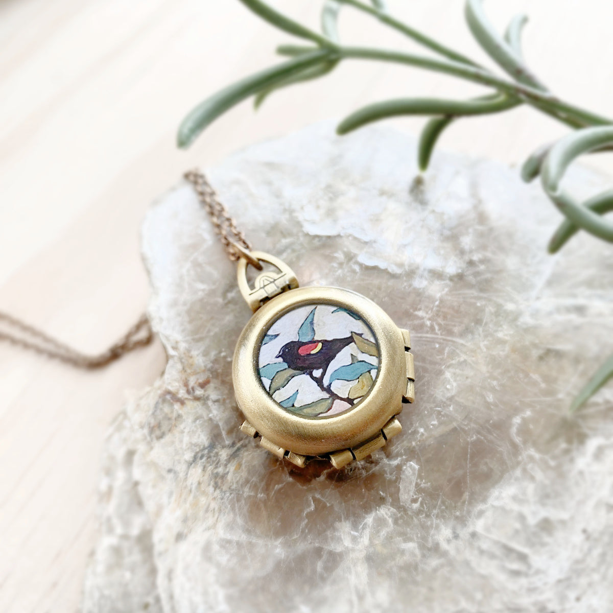 Red Wing Blackbird Locket, Artwork by guest artist Hannah Seng